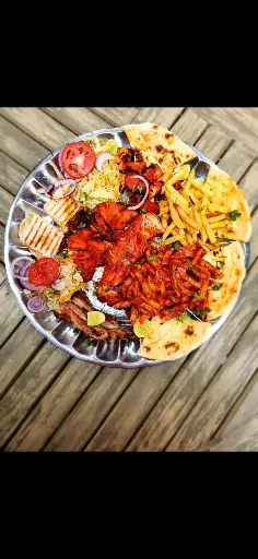 Mixed Platter Chooz chicken (full spring Chicken),Lemon Tikka/Chicken Tikka Beef,Mshikaki,Chicken mshikaki,Beef curry/Chicken curry,Plain rice,Pilau,Side of fries,Chapati,Salad